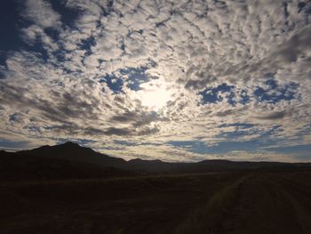 Scenic view of landscape against sky during sunset