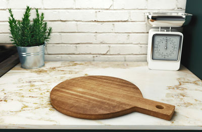 Cutting board on kitchen counter at home