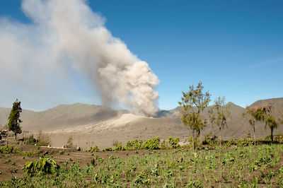 Panoramic view of volcanic landscape against sky