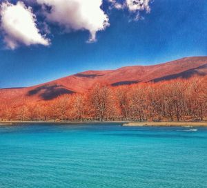 Scenic view of landscape against blue sky