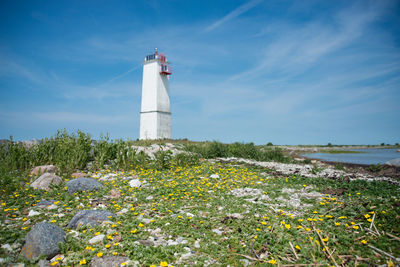 Lighthouse against blue sky