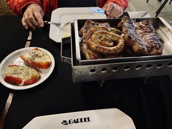 Midsection of man preparing food