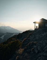 Scenic view of mountains against sky during sunset