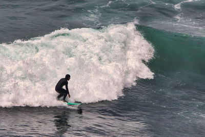 Man surfing in sea