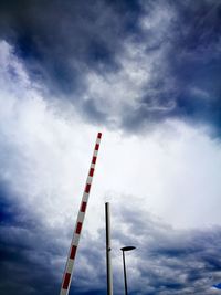 Low angle view of crane against sky