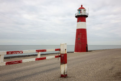 Small lighthouse westkapelle on the north sea, netherlands.