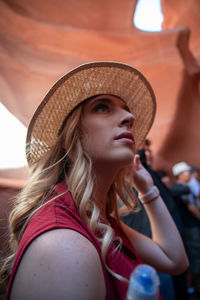 Portrait of young woman looking away