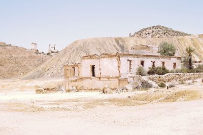 Old ruins of building against clear sky