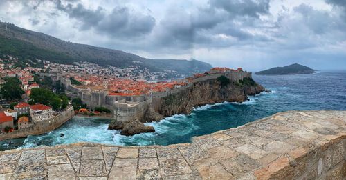 Panoramic view of sea against cloudy sky