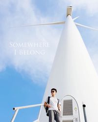 Low angle view of man standing against sky