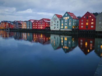 Reflection of houses in city at night