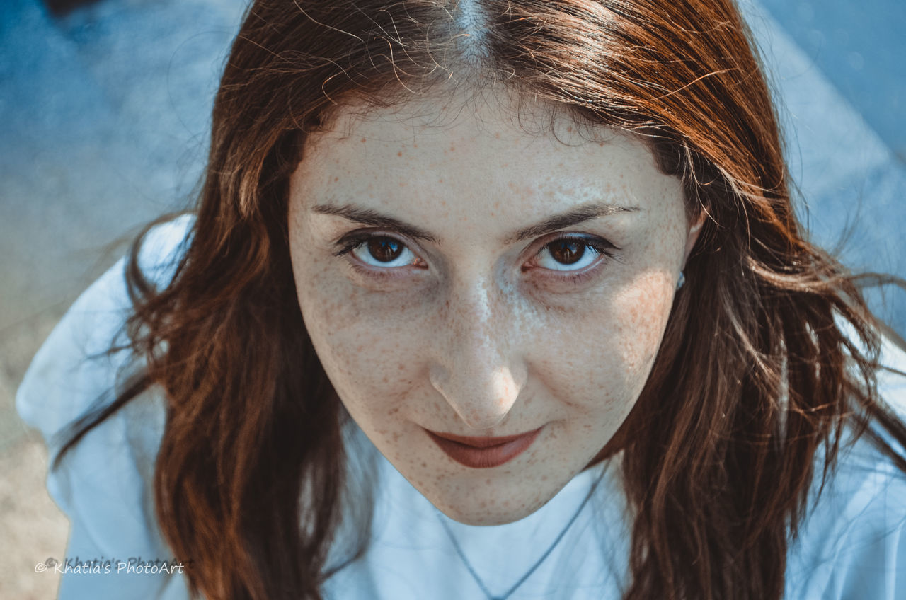 CLOSE-UP PORTRAIT OF YOUNG WOMAN WITH HAIR