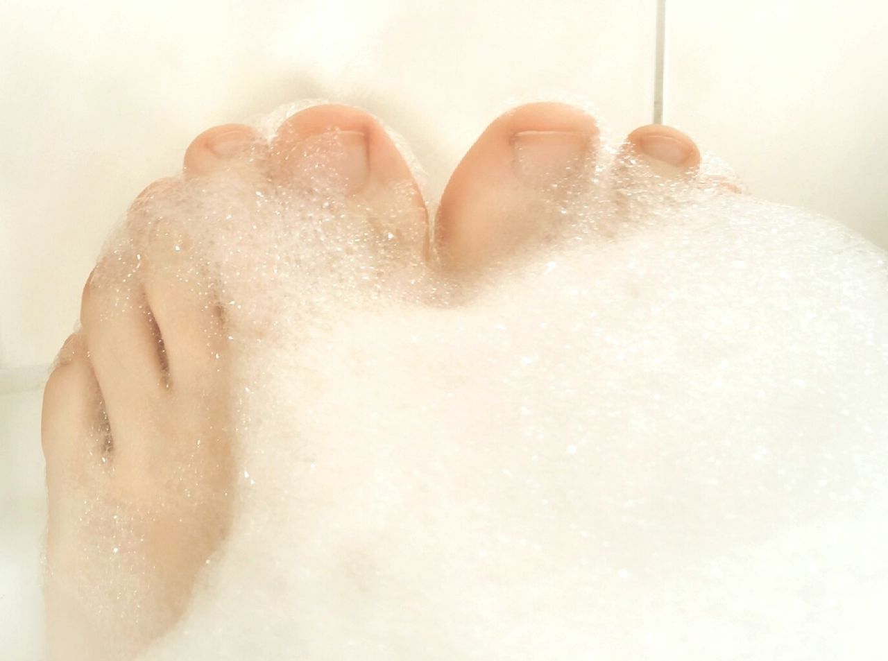 person, indoors, close-up, cold temperature, part of, lifestyles, studio shot, white background, frozen, cropped, wet, unrecognizable person, water, winter, ice, leisure activity