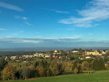 Scenic view of townscape against sky