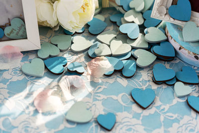 High angle view of heart shape decorations on table