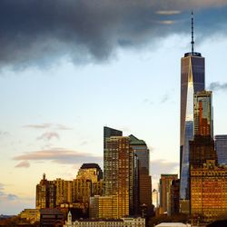 Skyscrapers in city against sky