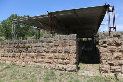 View of old wall against clear sky