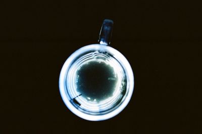 Close-up of black coffee over black background