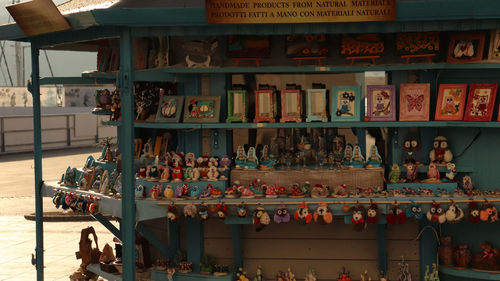 Various objects on shelves for sale at store