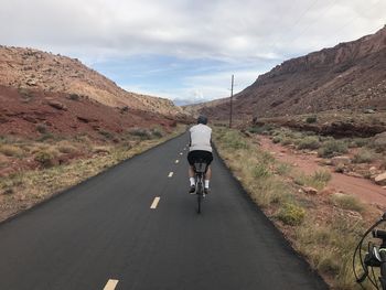 Cycling on an isolated utah road. 