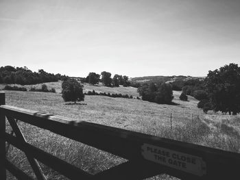 Scenic view of field against clear sky