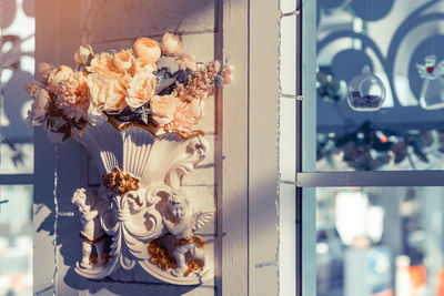 Close-up of flower vase on table