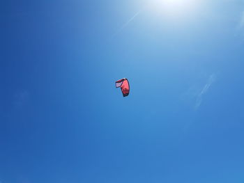 Low angle view of kite flying in sky