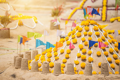 Multi colored flags hanging outside temple