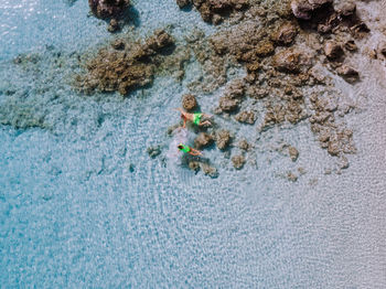 High angle view of people on sea shore