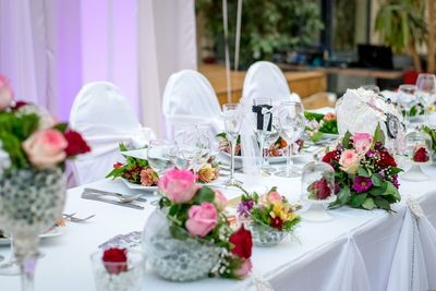 Close-up of wedding rings on table