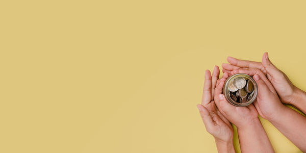 Close-up of hand holding ring