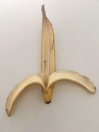 Close-up of bananas against white background