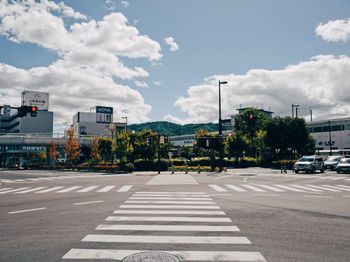 View of road against cloudy sky