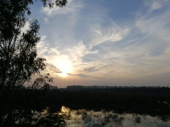 Scenic view of silhouette landscape against sky during sunset