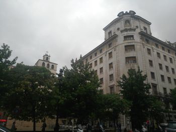 Low angle view of buildings against sky