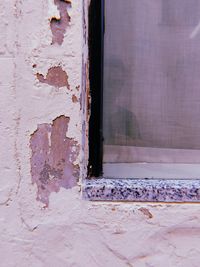 Close-up of weathered wall of old building