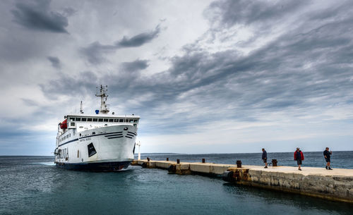 Nautical vessel on sea against sky