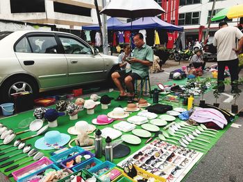 People at market stall