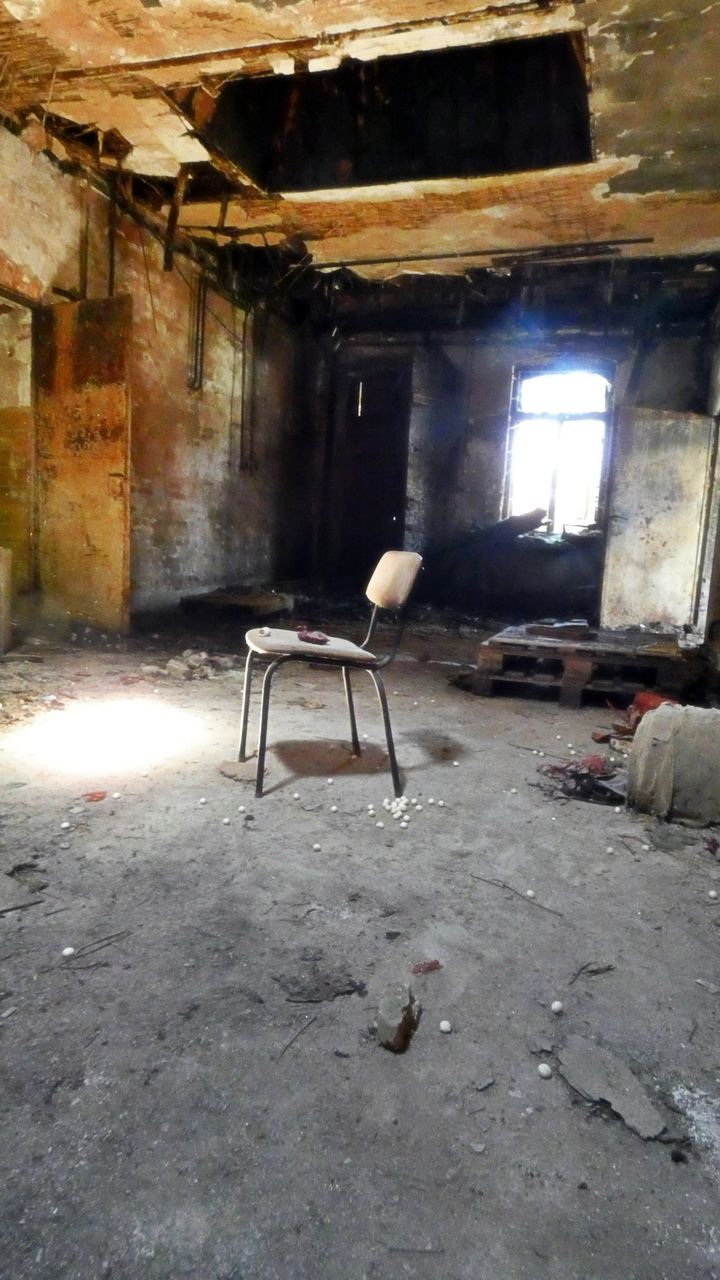 abandoned, architecture, indoors, damaged, no people, built structure, old, building, rundown, bad condition, floor, history, absence, seat, chair, window, ruined, decline, deterioration, broken, day, destruction, domestic room, wall, wood, empty, weathered, house, ceiling, the past, wall - building feature, dirt, home interior, furniture, flooring