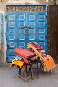 Multi colored chair outside building