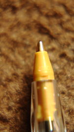 Close-up of yellow drink on table