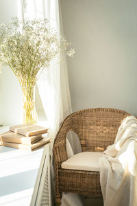 View of empty chair at bedroom