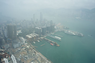 High angle view of cityscape by sea