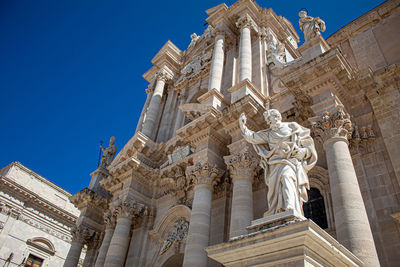 Low angle view of statue against clear sky