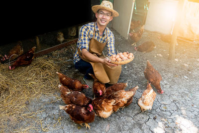 Full length of man holding food