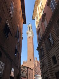 Low angle view of buildings against clear sky