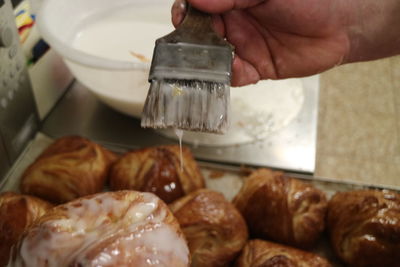 Close-up of man preparing food