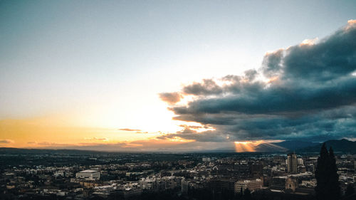 High angle view of townscape against sky during sunset