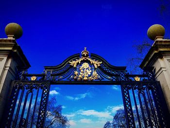Low angle view of built structure against blue sky