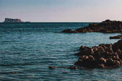 Scenic view of sea against clear sky